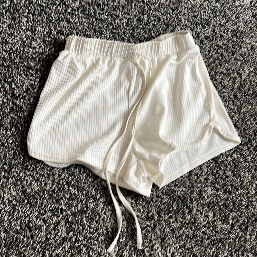 White loose shorts